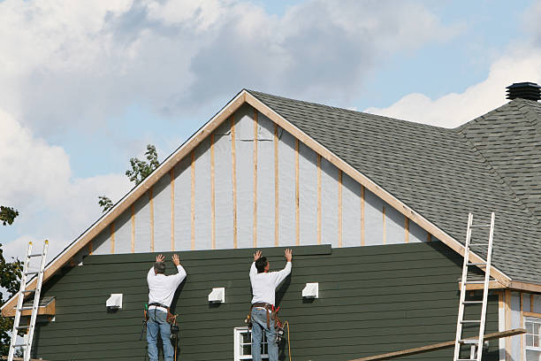 Professional Siding Contractor technician working in Elizabeth, CO